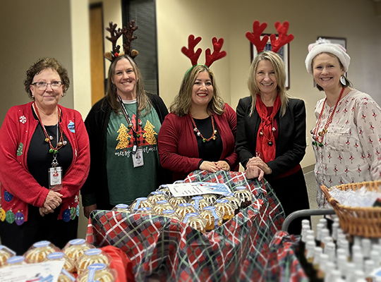 Team members celebrating holidays together 