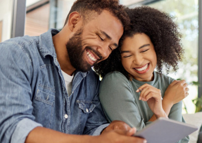 Two people smiling 